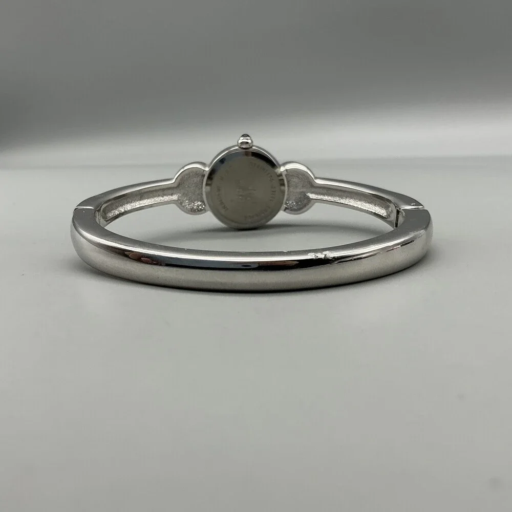 Nolan Miller Womens Watch 21mm Silver Tone MOP Dial Bangle Crystals 7
